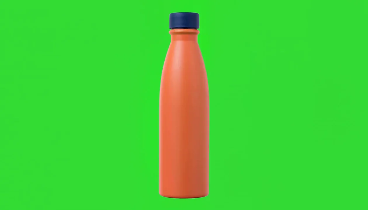 Orange bottle against green